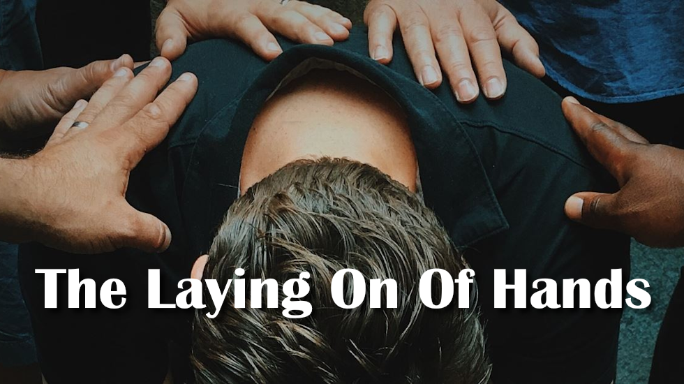 Laying On Of Hands